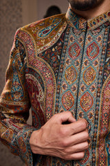 JAMAWAR PATTERNED SHORT ACHKAN PAIRED WITH A BLACK COTTON SILK KURTA AND SALWAR