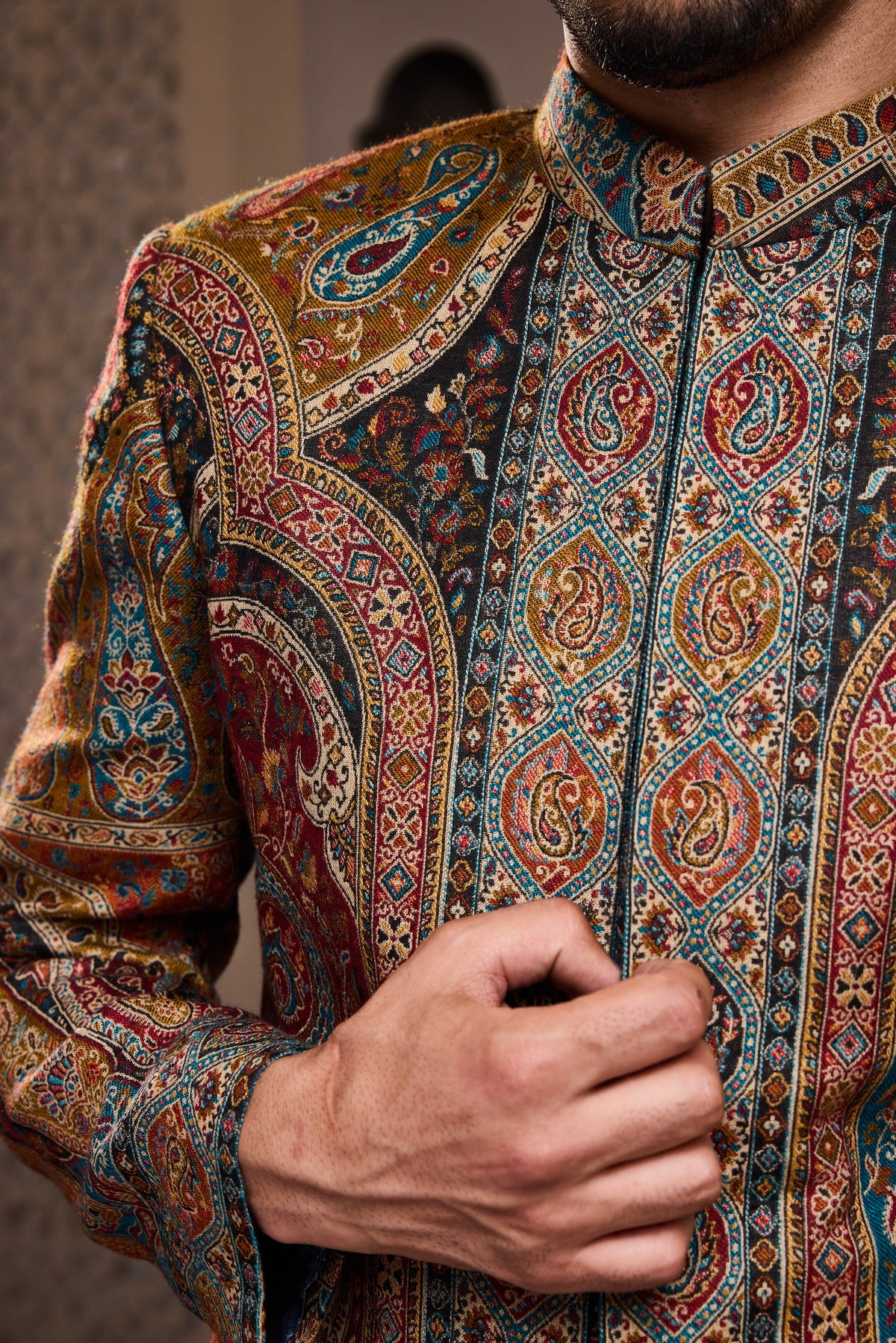 JAMAWAR PATTERNED SHORT ACHKAN PAIRED WITH A BLACK COTTON SILK KURTA AND SALWAR