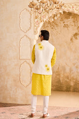 IVORY 3-D EMBROIDERED FLORAL WORK BUNDI WITH YELLOW KURTA CHURIDAR