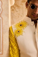IVORY 3-D EMBROIDERED FLORAL WORK BUNDI WITH YELLOW KURTA CHURIDAR