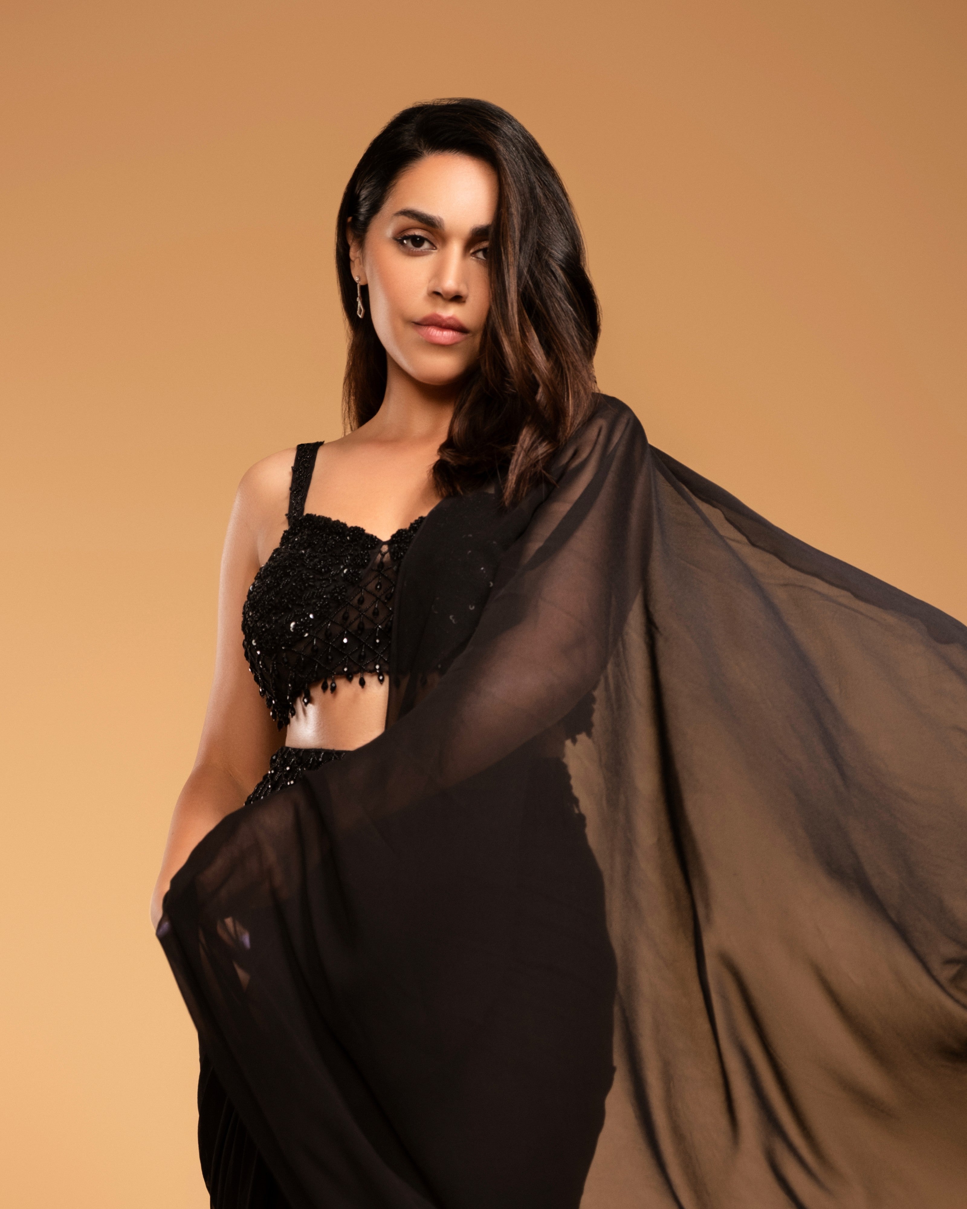 Black georgette saree with hand embroidered blouse