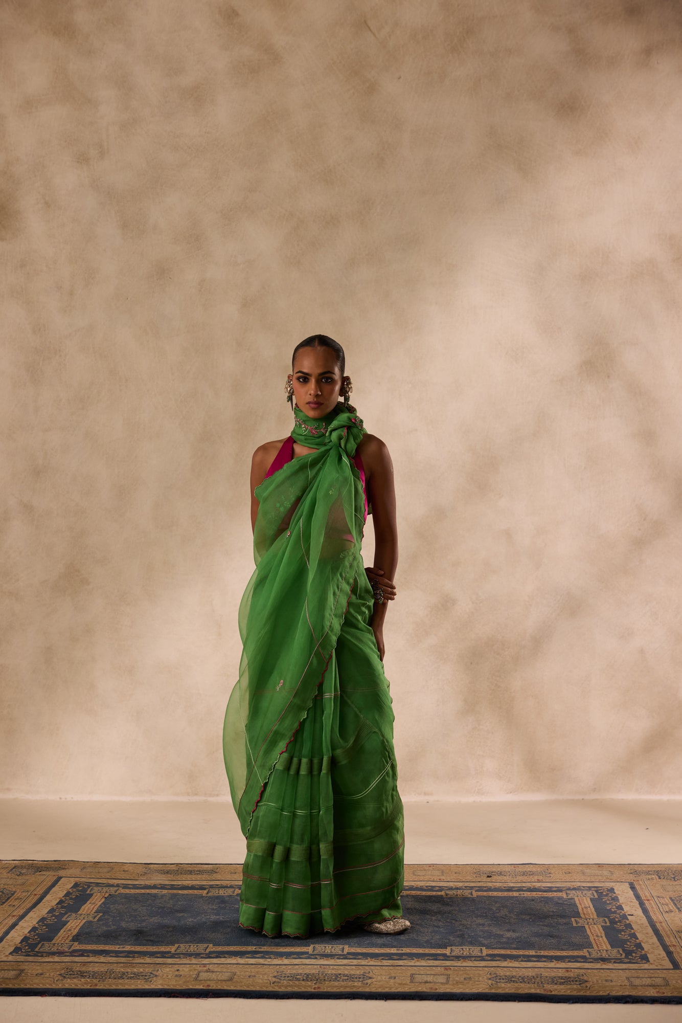 Green organza embroidered saree comes with unstitched & unembroidered blouse fabric in chanderi