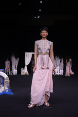 Peachy Pink ajrakh stripwork jacket paired up with Peachy pink bralette and drape dhoti skirt