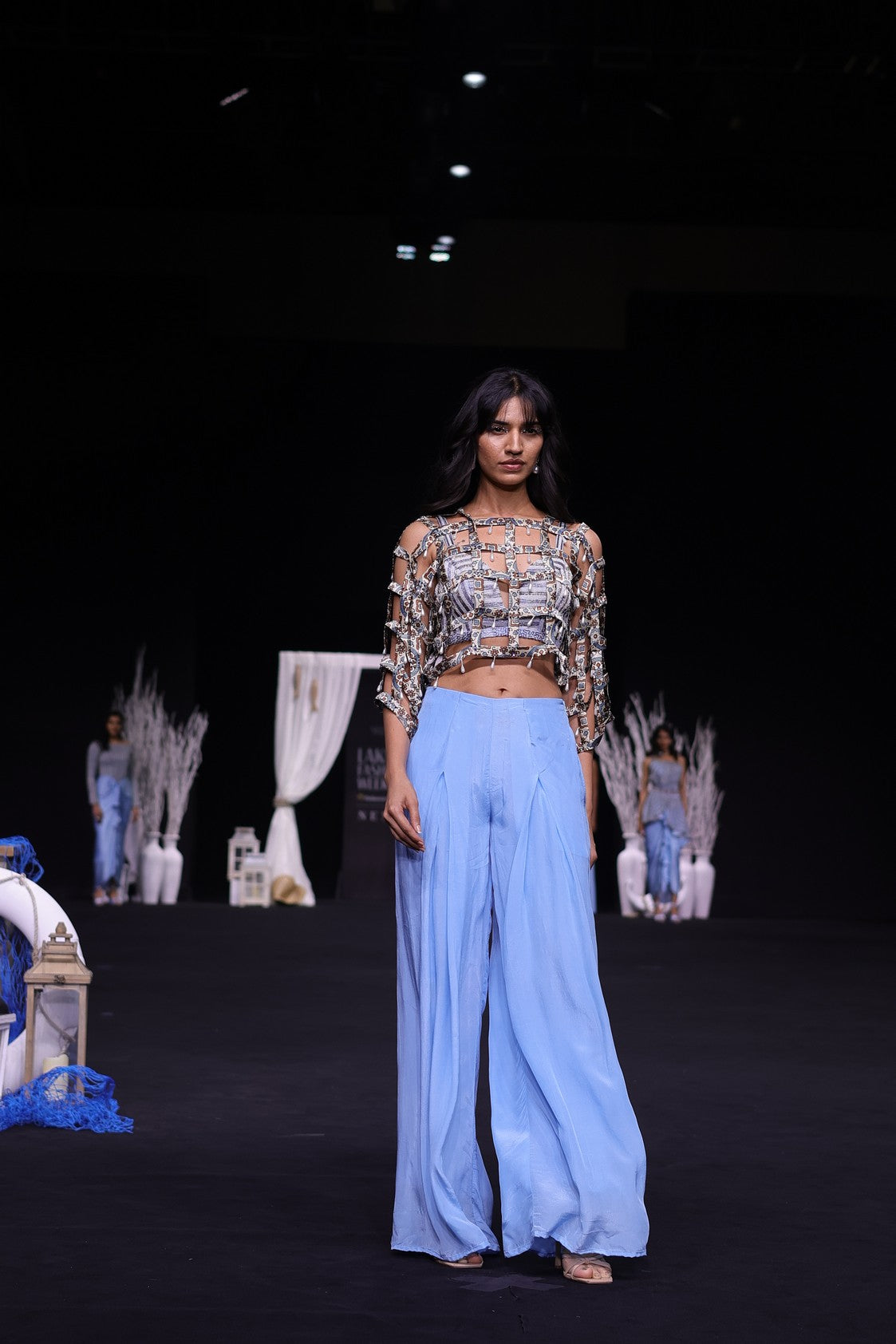 Powder blue ajrakh stripped jacket with embellished brallete and inverted pleated pants