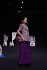 Purple fully embellished ajrakh peplum top with tiered sharara set