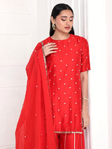 Short kurta is paired with kali palazzo and a dupatta