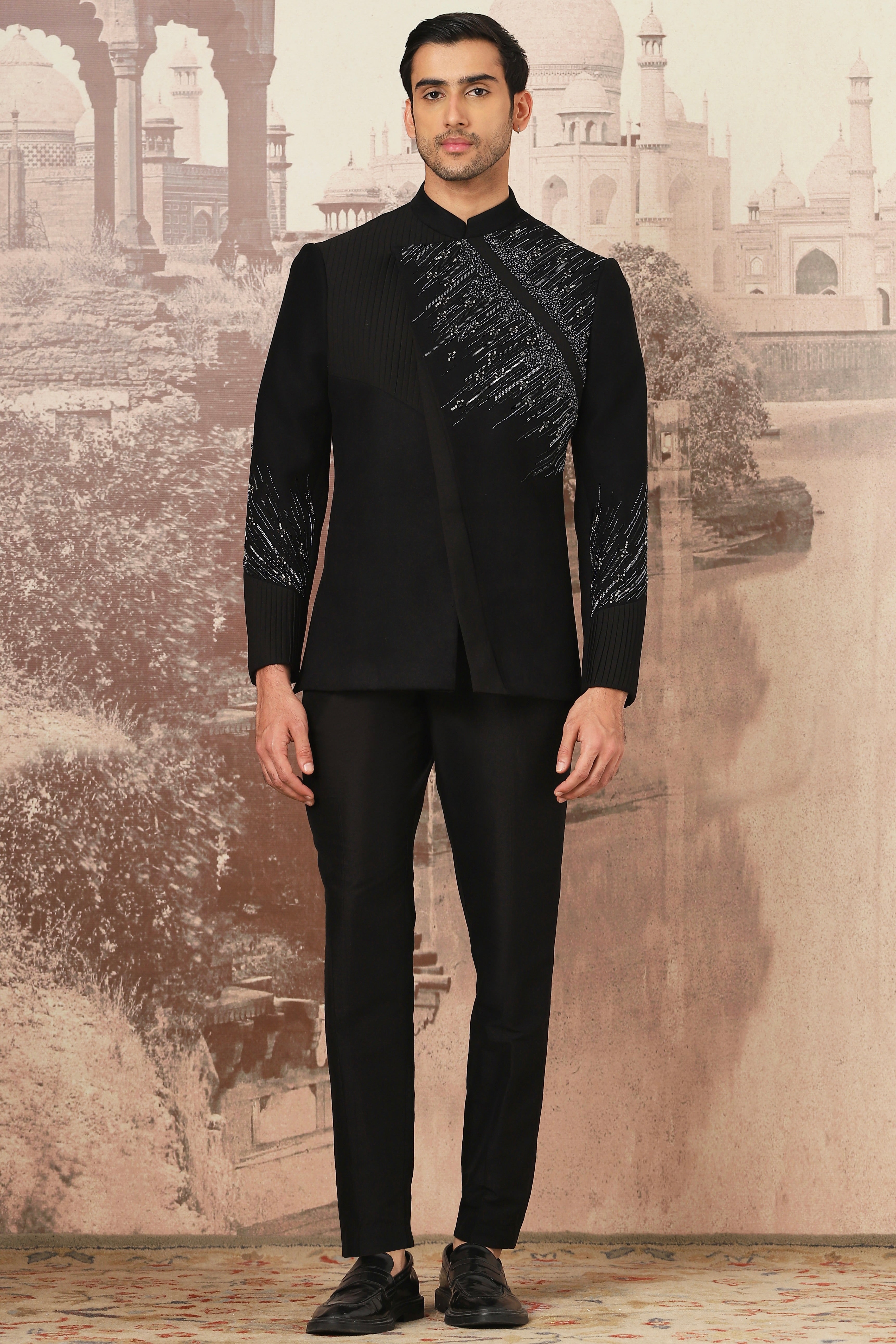 The Midnight Black Asymmetrical Hand Embroidered Bandhgala Set .