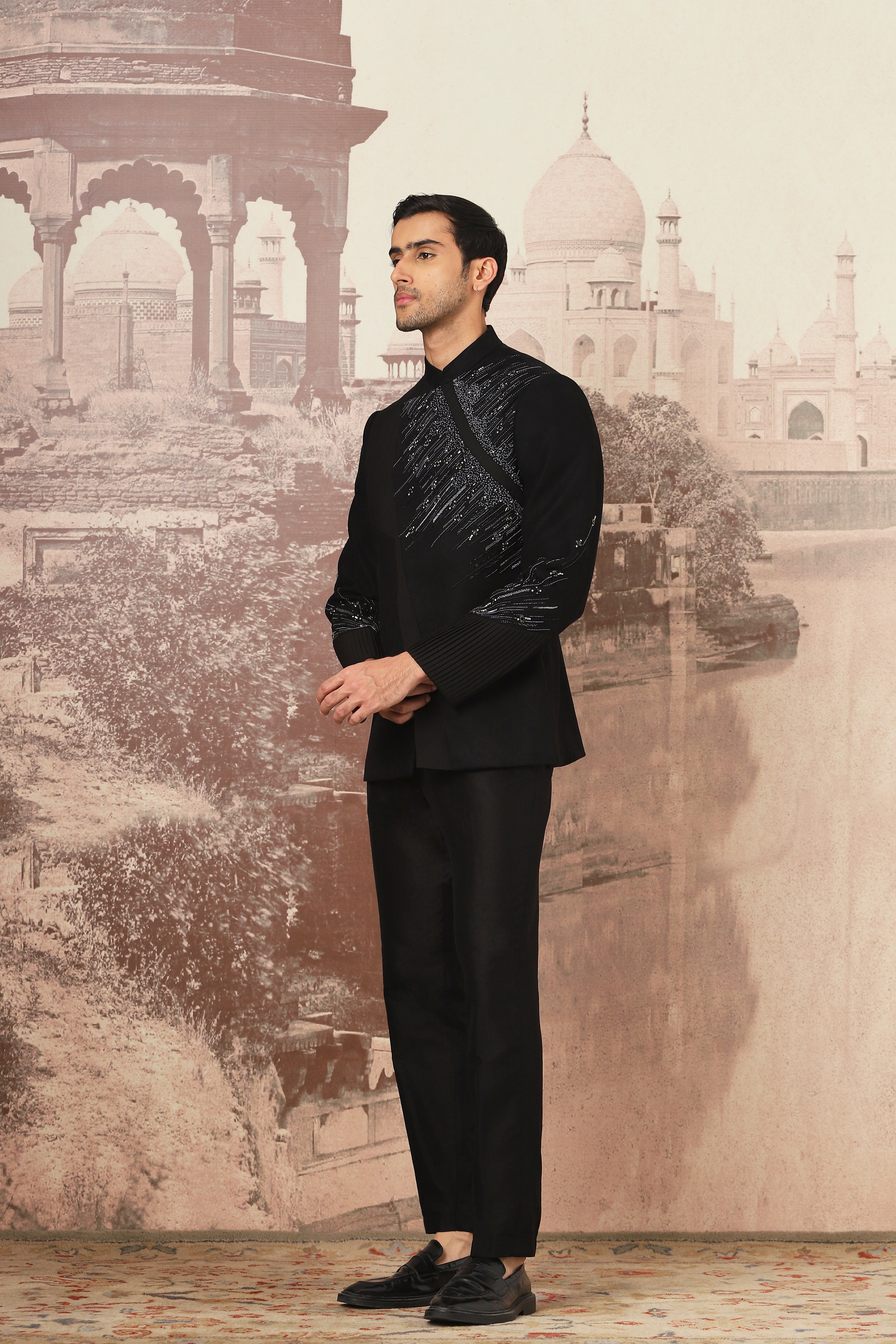 The Midnight Black Asymmetrical Hand Embroidered Bandhgala Set .