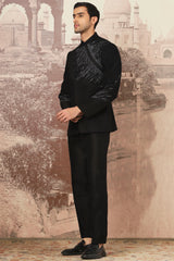 The Midnight Black Asymmetrical Hand Embroidered Bandhgala Set .