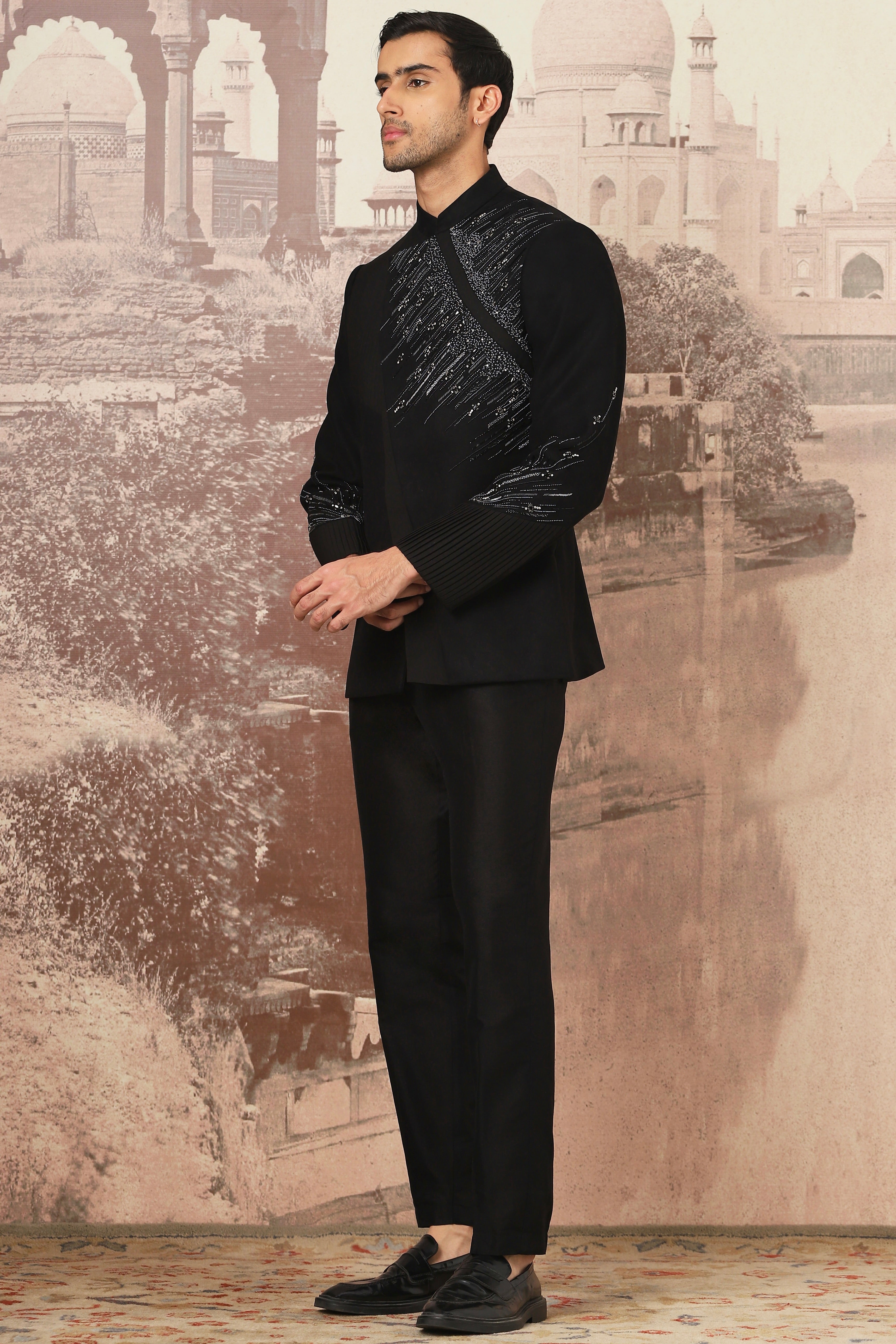 The Midnight Black Asymmetrical Hand Embroidered Bandhgala Set .