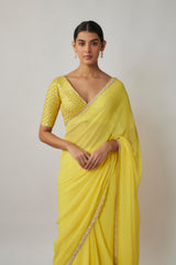 Lemon yellow sequin and zari embroidered georgette saree set