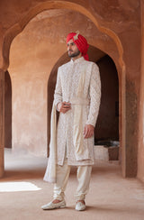 IVORY TAFETTA SHERWANI WITH MONGA SILK KURTA AND CHURIDAR