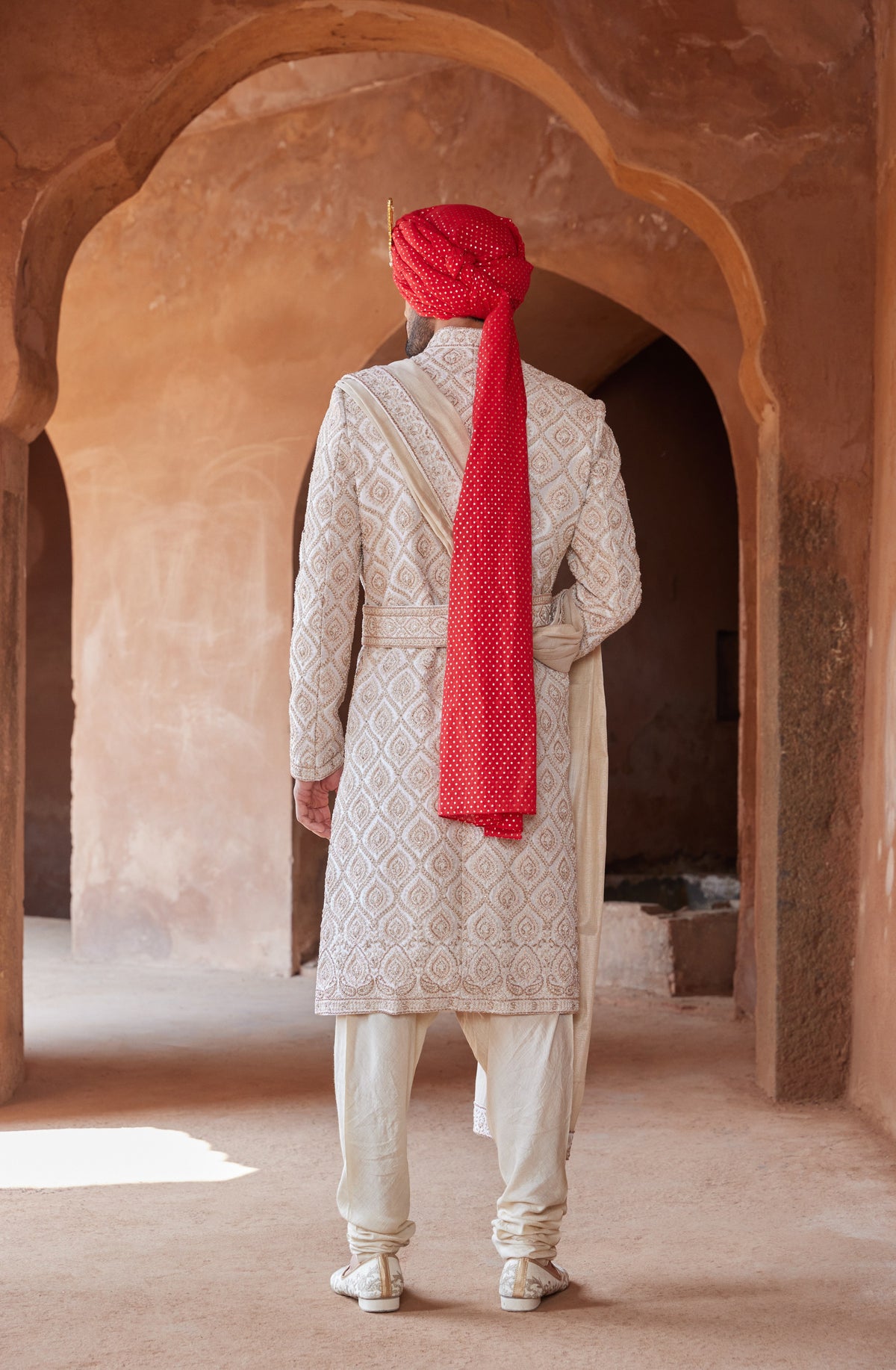 IVORY TAFETTA SHERWANI WITH MONGA SILK KURTA AND CHURIDAR
