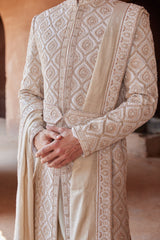 IVORY TAFETTA SHERWANI WITH MONGA SILK KURTA AND CHURIDAR