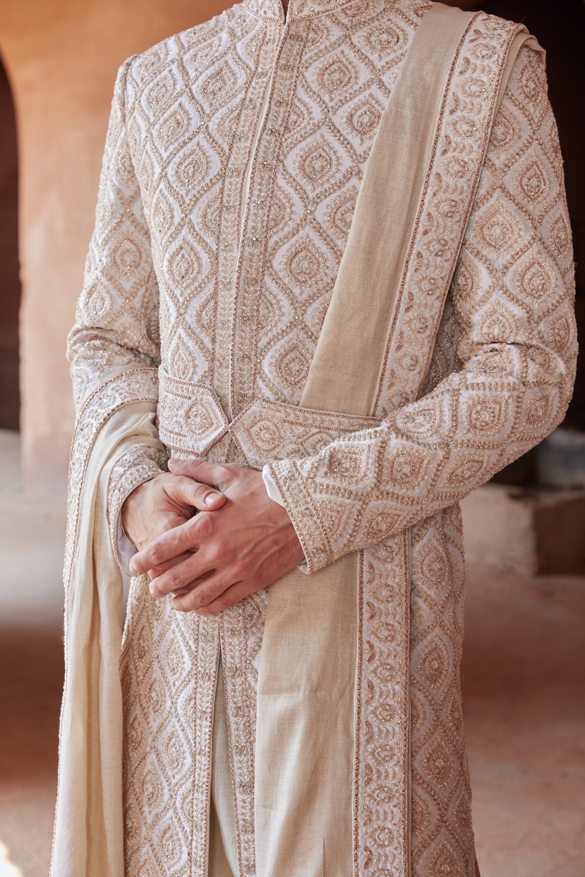 IVORY TAFETTA SHERWANI WITH MONGA SILK KURTA AND CHURIDAR