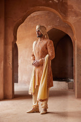 RUST MATKA SILK EMBROIDERED SHERWANI WITH BEIGE MONGA TUSSAAR KURTA CHURIDAR