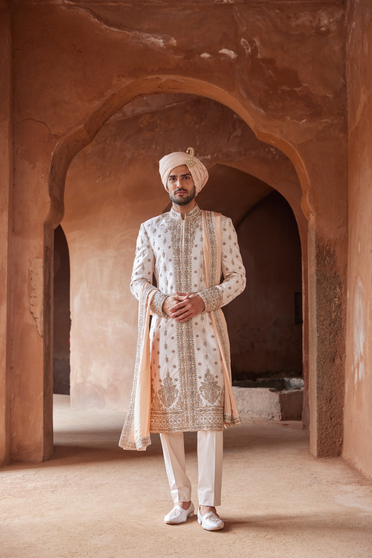 BLUSH PINK TAFETTA SILK EMBROIDERED SHERWANI WITH A MONGA TUSSAR KURTA AND COTTON LYCRA TROUSER
