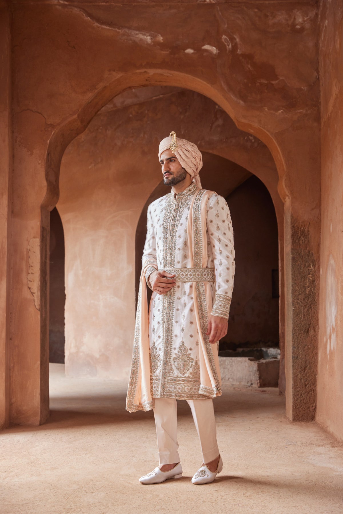 BLUSH PINK TAFETTA SILK EMBROIDERED SHERWANI WITH A MONGA TUSSAR KURTA AND COTTON LYCRA TROUSER