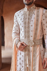 BLUSH PINK TAFETTA SILK EMBROIDERED SHERWANI WITH A MONGA TUSSAR KURTA AND COTTON LYCRA TROUSER