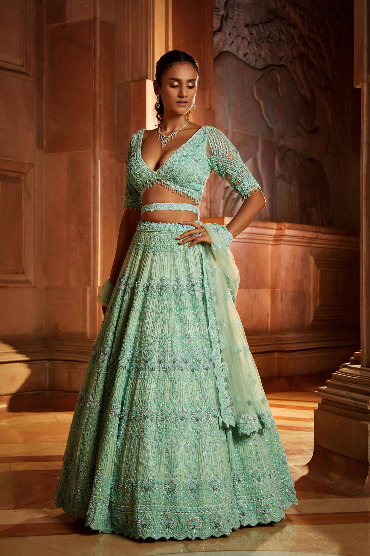 Vibrant Mint Green Tulle Lehenga Choli Dupatta with a Worked Belt