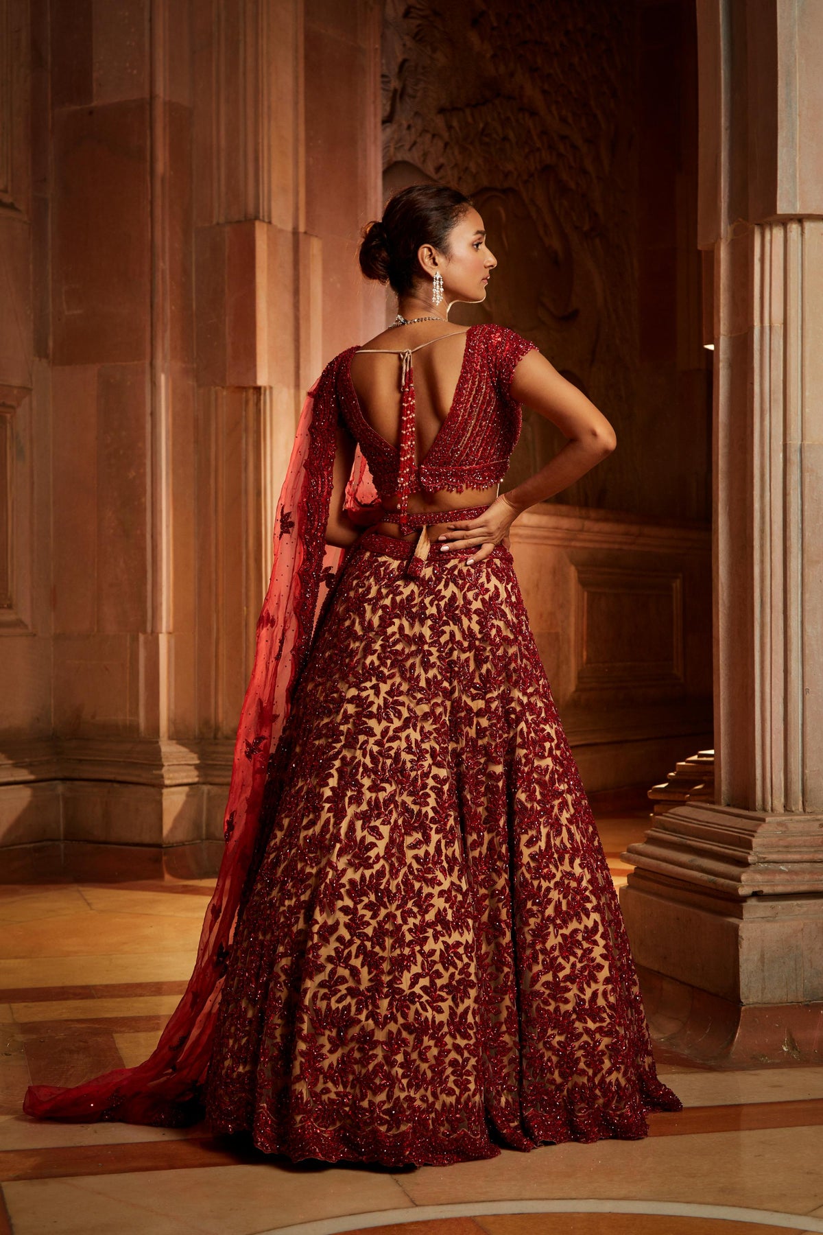 Nude Tulle Lehenga Choli with worked Belt and contrasting Organza Dupatta with an Optional Tulle Veil