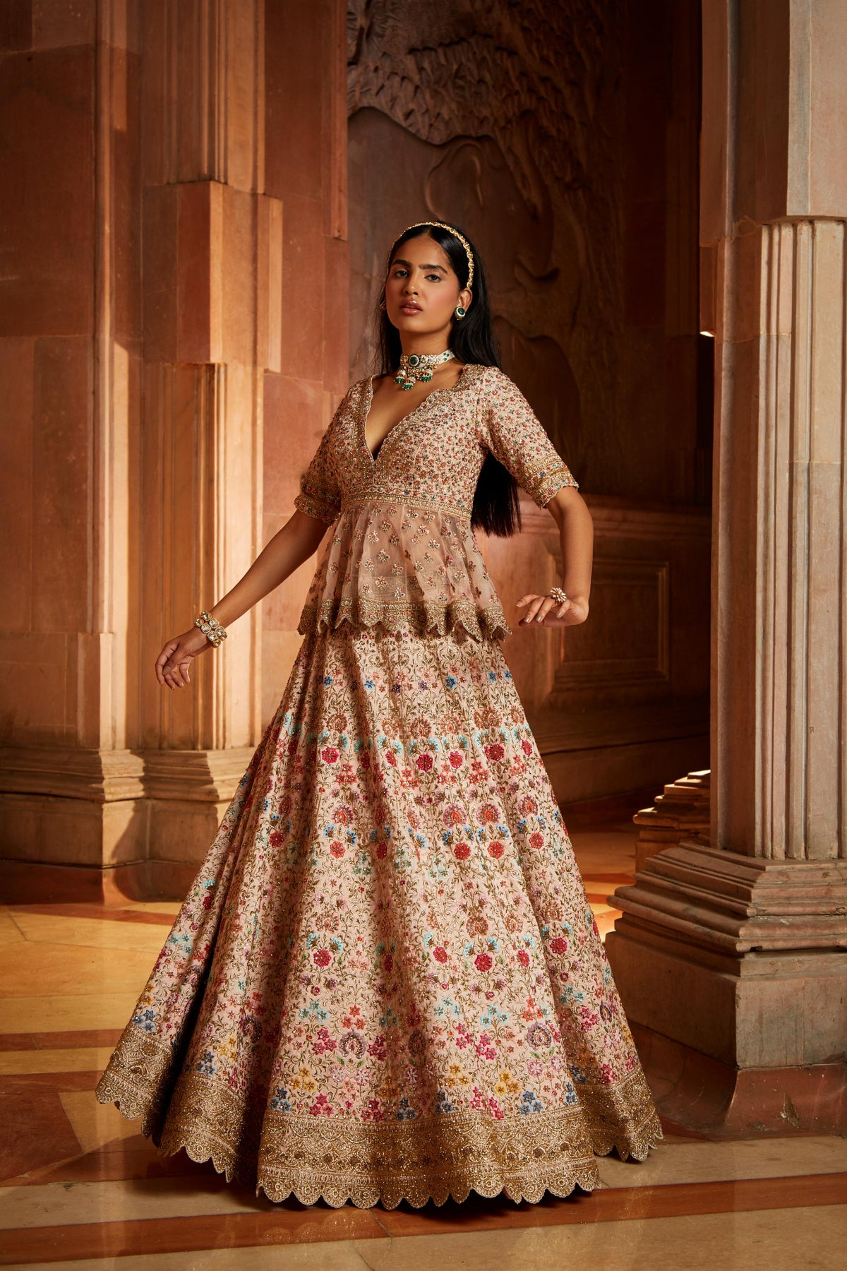 Blush Pink Raw Silk Lehenga with a Peplum Top and Tulle Dupatta