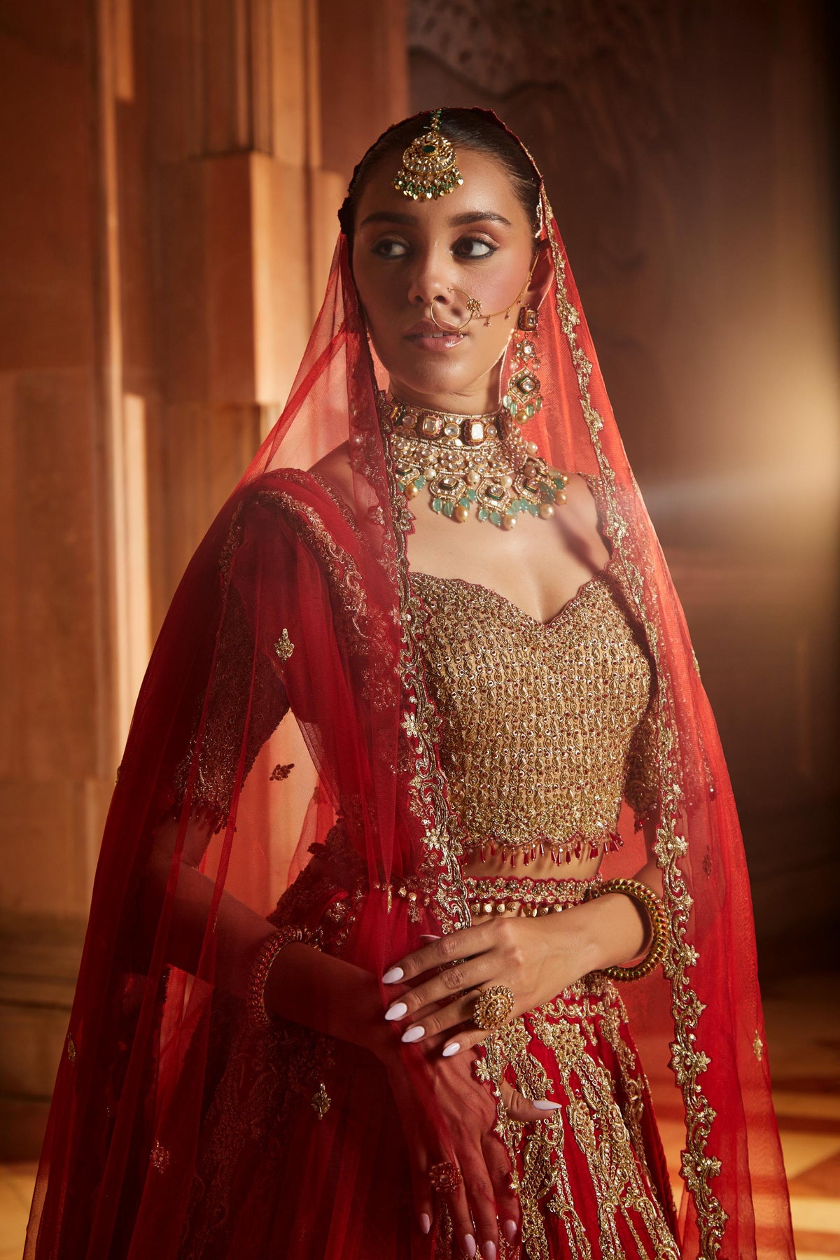 Deep Red Raw Silk Lehenga with Gold Choli and Tulle Dupatta