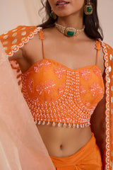 Orange bustier with drape skirt & cape