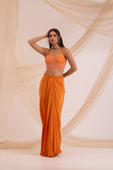 Orange bustier with drape skirt & cape