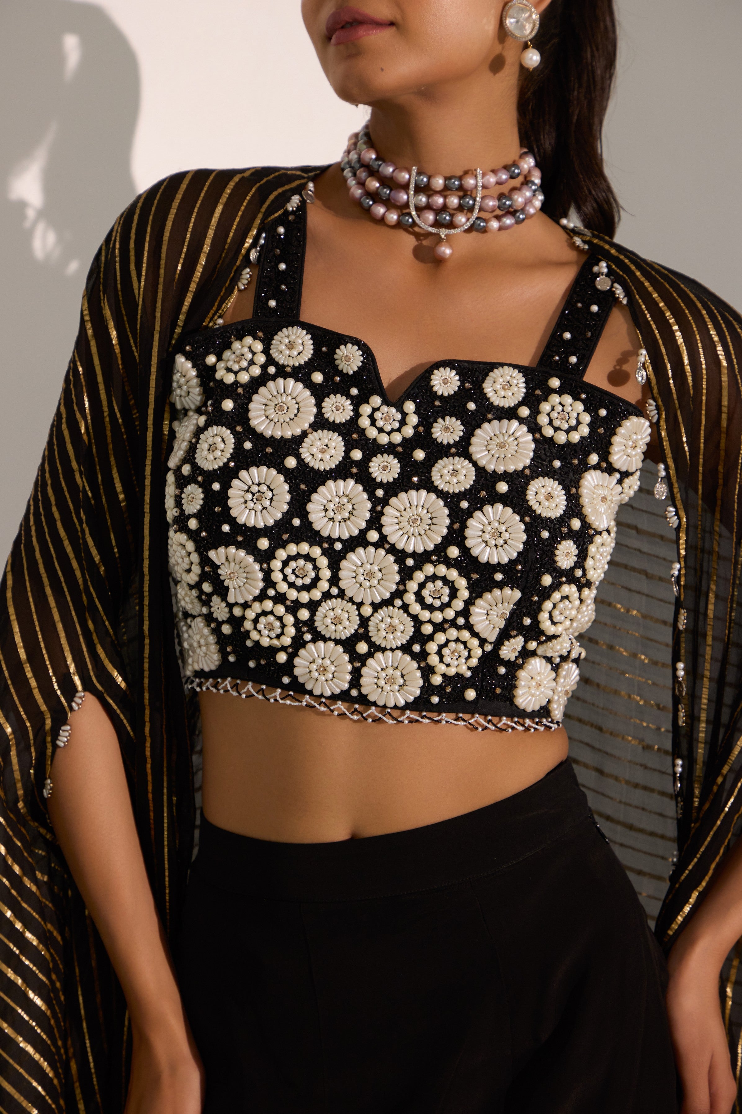 Black bustier with side slit skirt & cape set