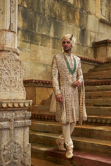 CREAM TAFFETA SHERWANI APPLIQUE AND ZARDOZI JAAL SET