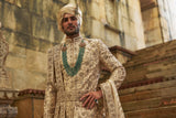 CREAM TAFFETA SHERWANI APPLIQUE AND ZARDOZI JAAL SET