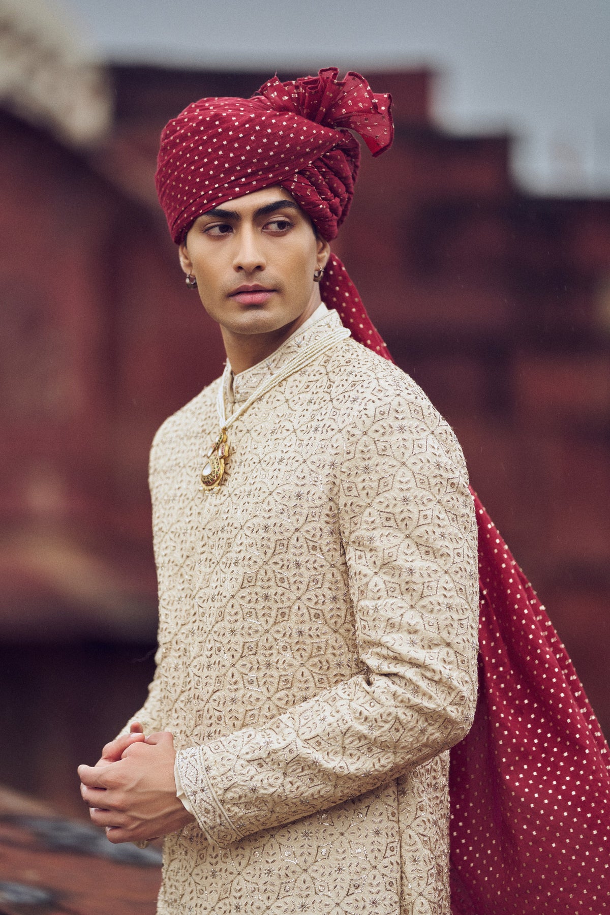 LIGHT BEIGE RAW SILK SHERWANI WITH KURTA AND CHURIDAR WITH OPTIONAL BELT, STOLE AND JUTIS