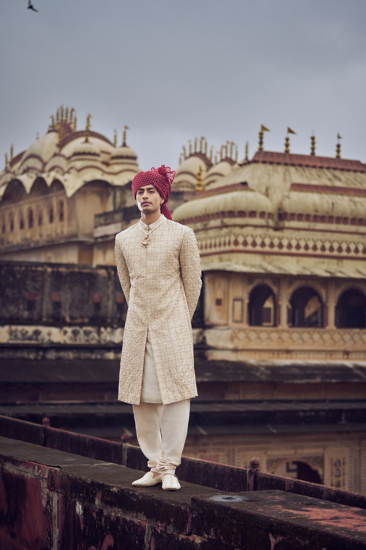 LIGHT BEIGE RAW SILK SHERWANI WITH KURTA AND CHURIDAR WITH OPTIONAL BELT, STOLE AND JUTIS