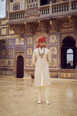 LIGHT BEIGE RAW SILK SHERWANI WITH KURTA CHURIDAR AND OPTIONAL WORKED STOLE, BELT AND JUTIS