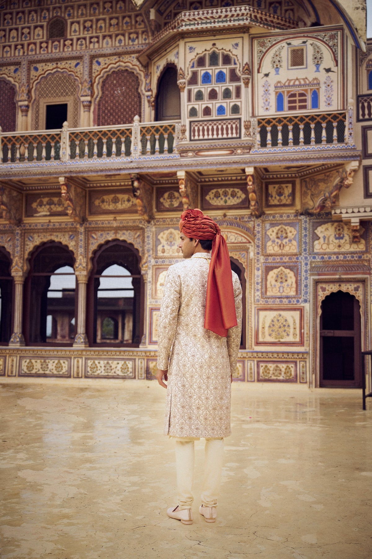 LIGHT BEIGE RAW SILK SHERWANI WITH KURTA CHURIDAR AND OPTIONAL WORKED STOLE, BELT AND JUTIS
