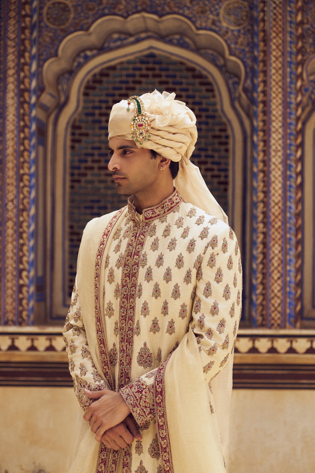 BEIGE RAW SILK SHERWANI WITH COTTON SILK CHOGA AND CHURIDAR WITH OPTIONAL STOLE AND JUTIS