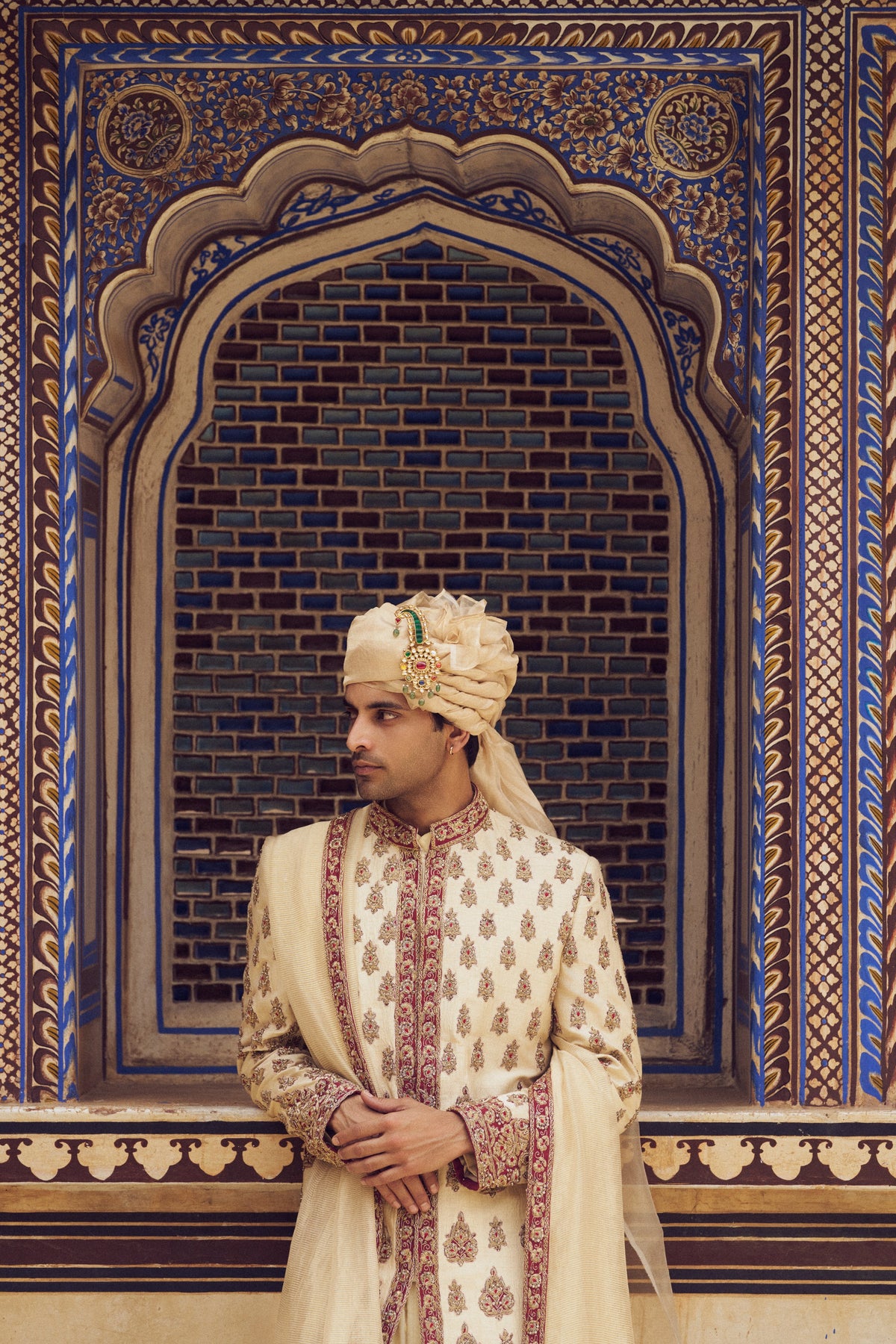 BEIGE RAW SILK SHERWANI WITH COTTON SILK CHOGA AND CHURIDAR WITH OPTIONAL STOLE AND JUTIS