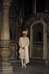 PEACH RAW SILK SHERWANI WITH KURTA AND TROUSER WITH OPTIONAL WORKED STOLE, BELT AND JUTIS