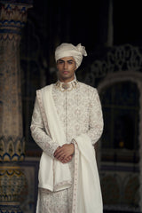 IVORY AND BEIGE RAW SILK SHERWANI SET WITH KURTA AND CHURIDAR WITH OPTIONAL BELT, STOLE AND JUTIS