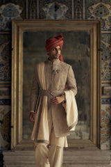 MOCCA RAW SILK SHERWANI WITH KURTA AND CHURIDAR WITH OPTIONAL WORKED STOLE, BELT AND JUTTIS