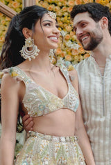 Off white embroidered choli and sharara