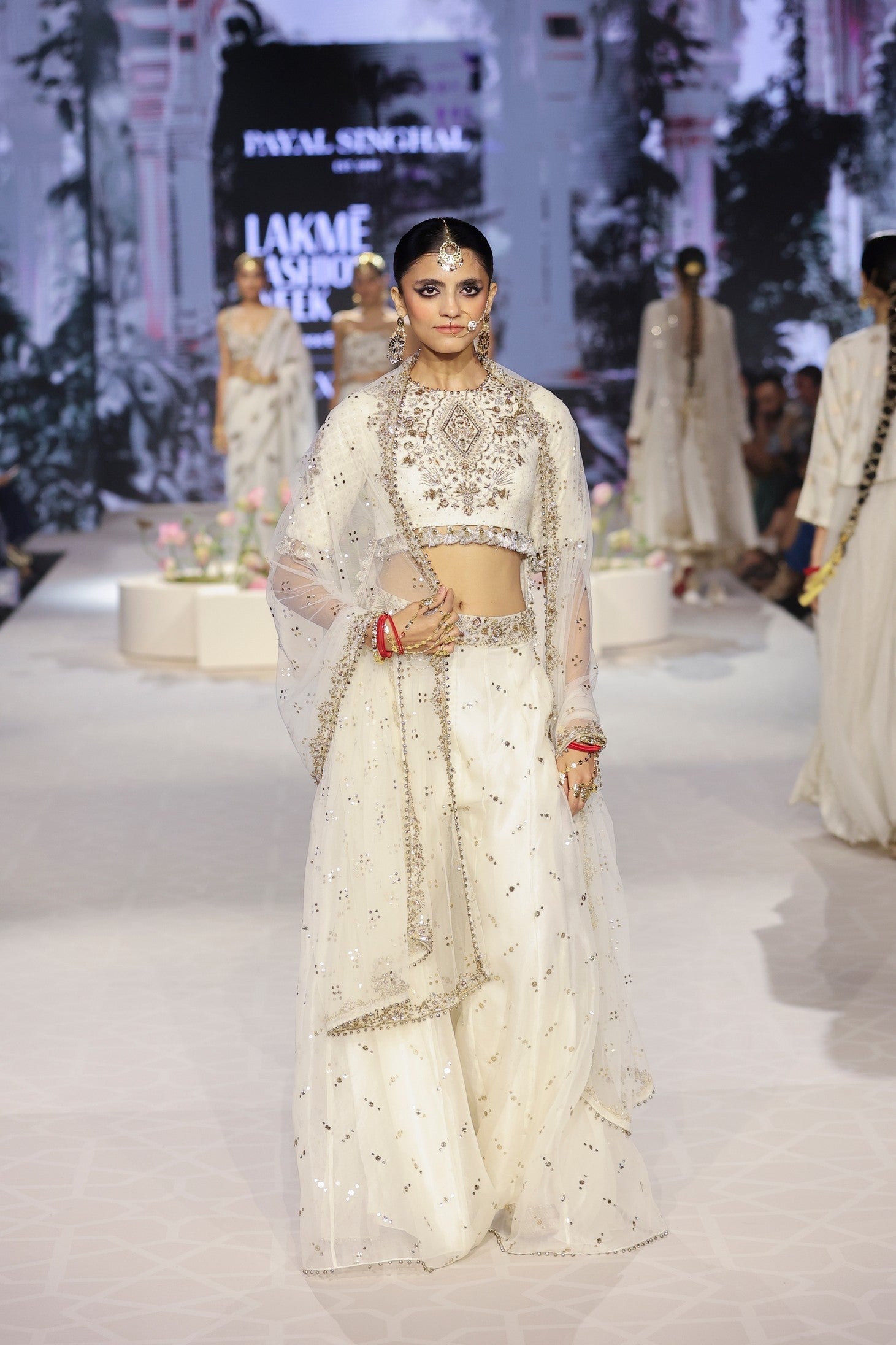 Shakira Off White Embroidered High Low Choli With Sharara And Dupatta