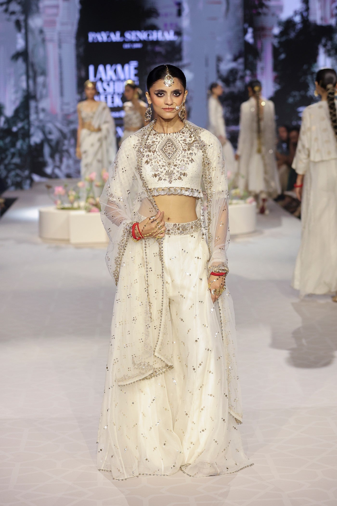 Shakira Off White Embroidered High Low Choli With Sharara And Dupatta