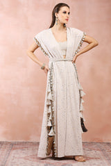 Cream jacket with silver tissue bustier and pant.