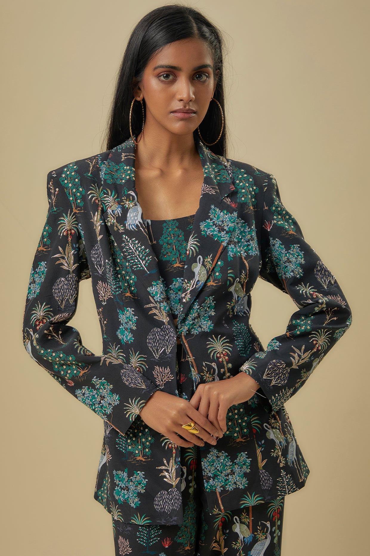 Black Crane Print Lifted Jacket With Plain Bustier And Pants.