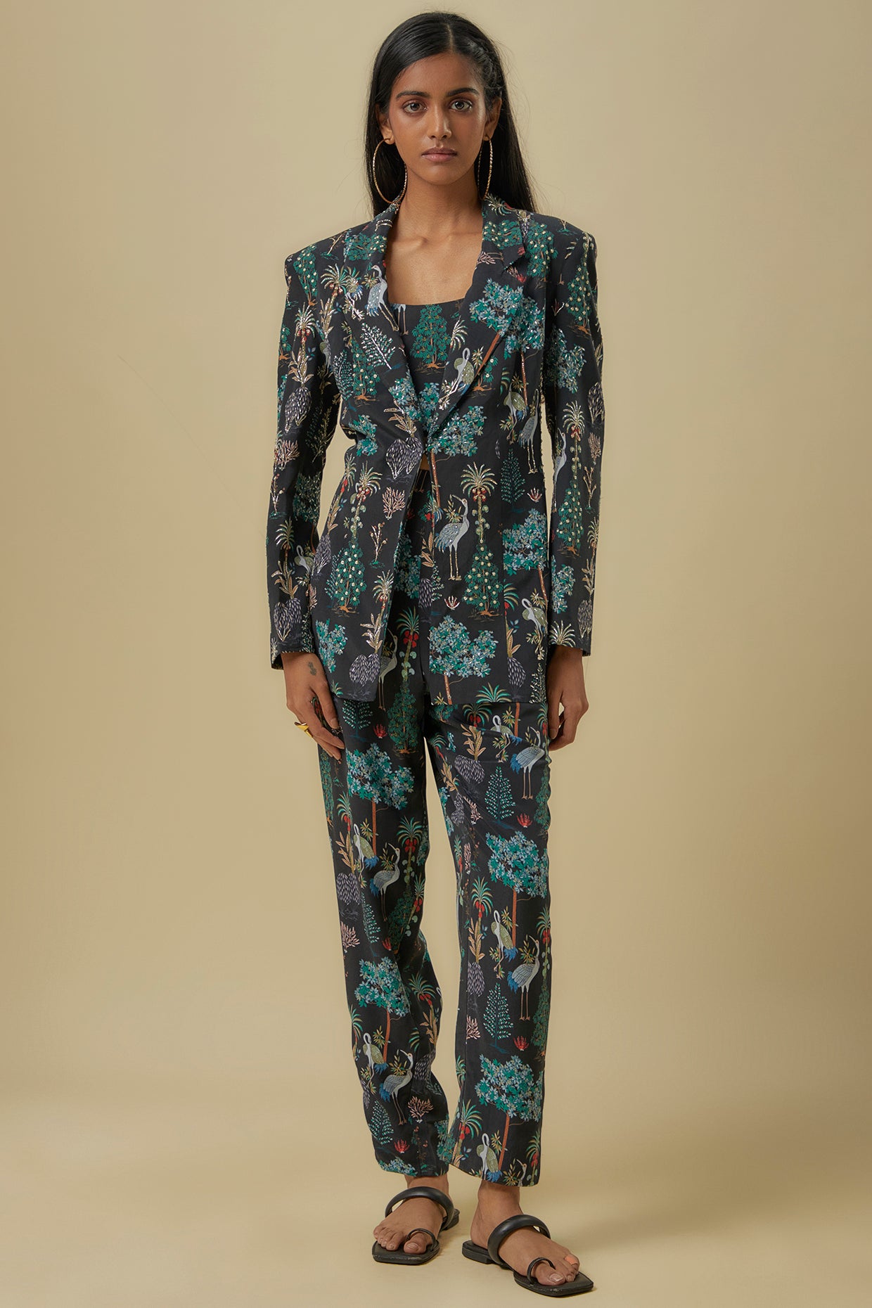 Black Crane Print Lifted Jacket With Plain Bustier And Pants.