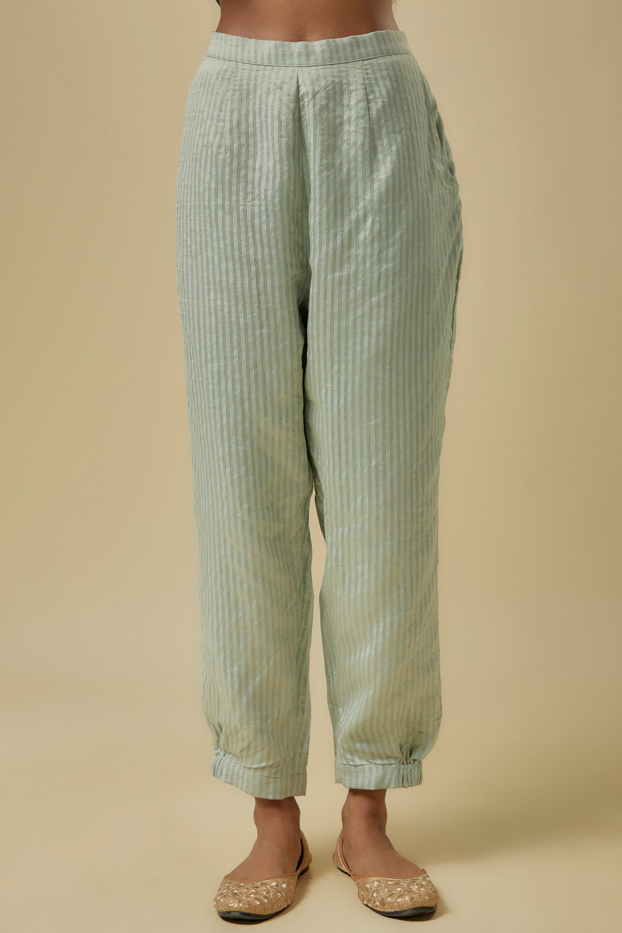 Pale Blue Gold Stripes Chanderi Embroidered Yoke Short Kurta And Jogger Pants With Mukaish Net Dupatta.