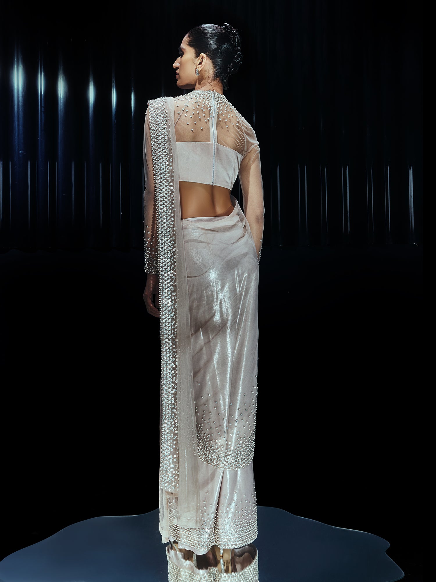 Pearl Drenched mesh saree paired with a structured sweetheart blouse