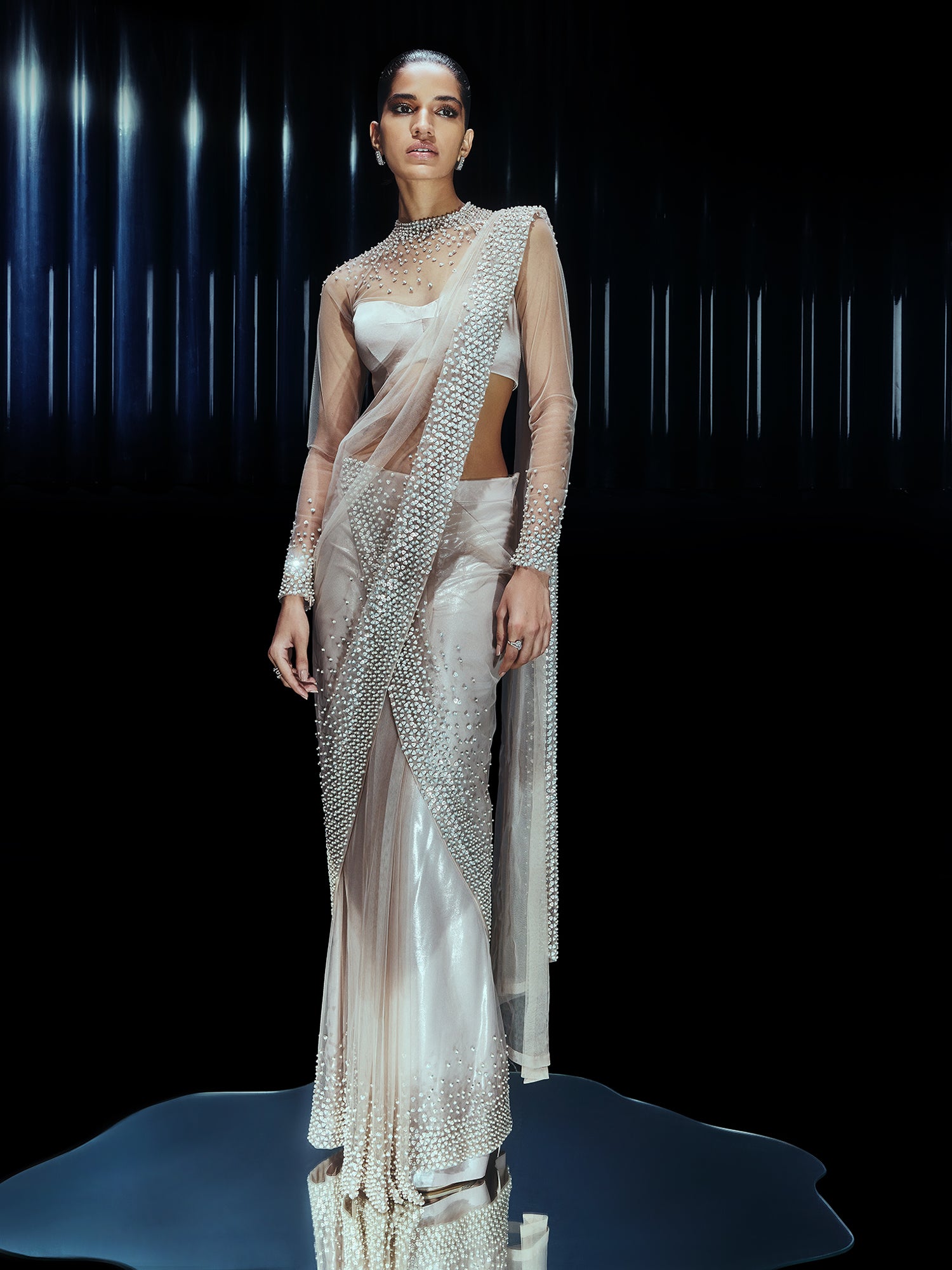 Pearl Drenched mesh saree paired with a structured sweetheart blouse